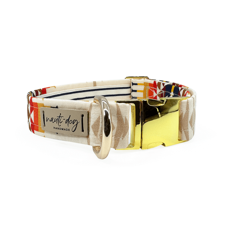 Dog collar with colorful pattern and gold buckle on a white background