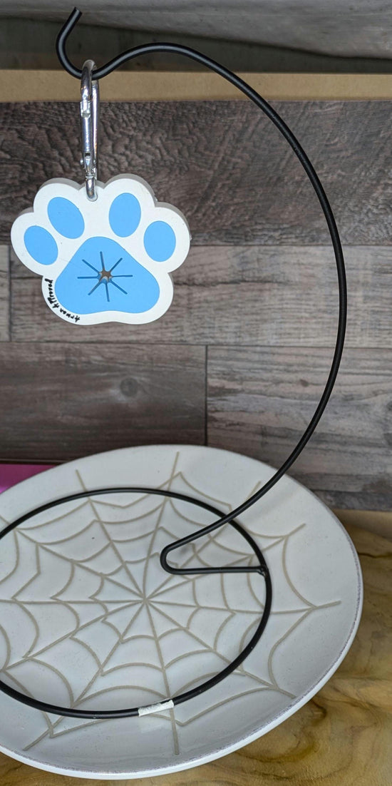 Hands free poop holder/waste bag holder paw print